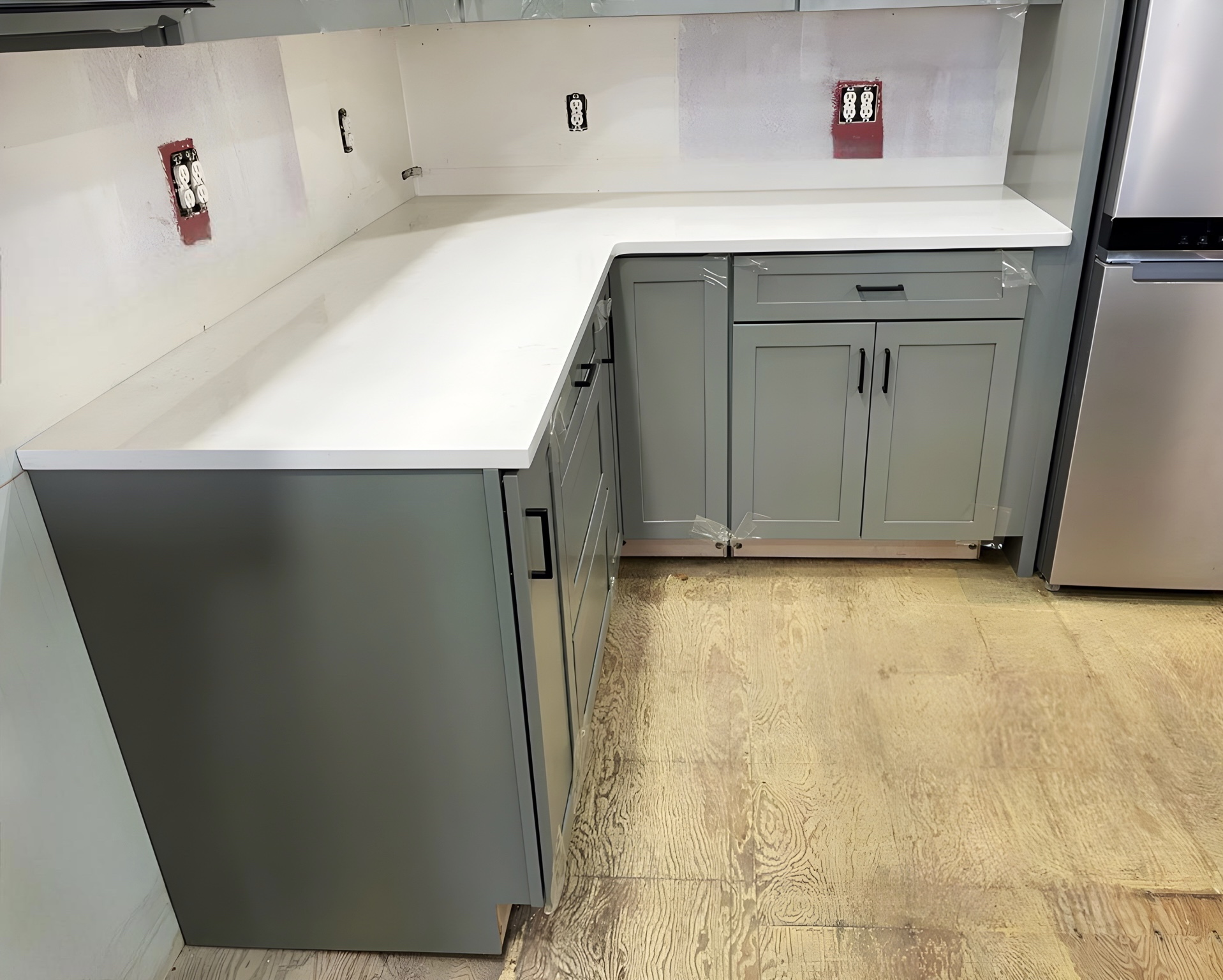 granite-depot-of-indianapolis-carrara-hillos-and-light-green-cabinets